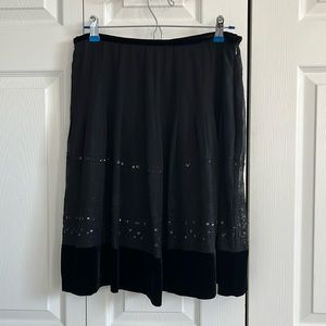 Size 8 silk/velvet a- line skirt with sequin embellishments, never worn.